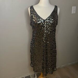 INC GREY/silver sequence dress. Excellent condition. Never worn. Lined. XL.